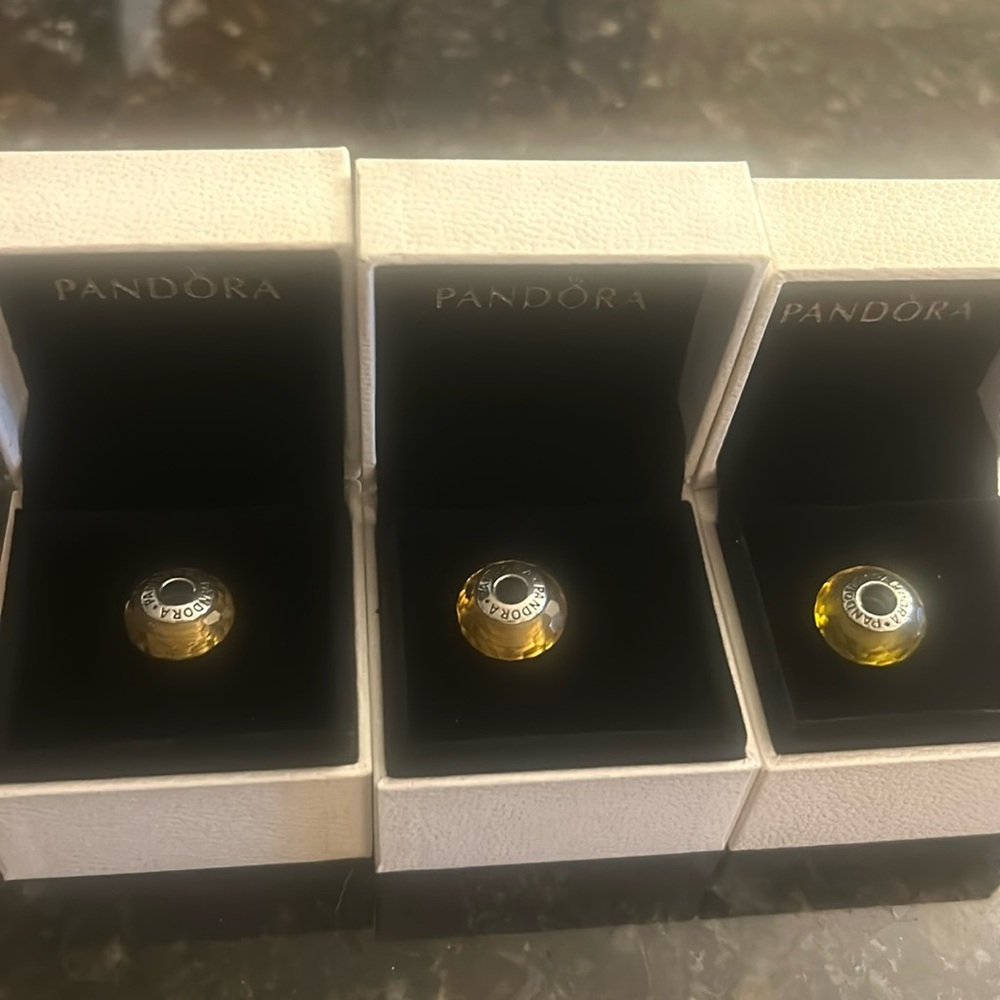 (3) Pandora murano glass faceted beads honey color, sterling silver core